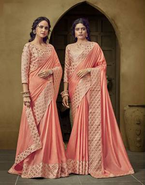 Simple and Elegant Looking Saree Is Here In Peach Color. This Plain Saree Has Weaved Broad Border. This Saree Is Fabricated On Art Silk Paired With Brocade Fabricated Blouse. Buy Now. 