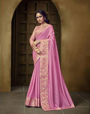 Simple and Elegant Looking Saree Is Here In Pink Color. This Plain Saree Has Weaved Broad Border. This Saree Is Fabricated On Art Silk Paired With Brocade Fabricated Blouse. Buy Now. 