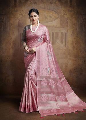 Celebrate This Festive Season In This Very Beautiful And Attractive Looking Designer Saree In Pink Color Paired With Contrasting Mauve Colored Blouse. This Saree and Blouse Are Fabricated On Jacquard Silk Beautified With Weave All Over. Buy This Saree Now.