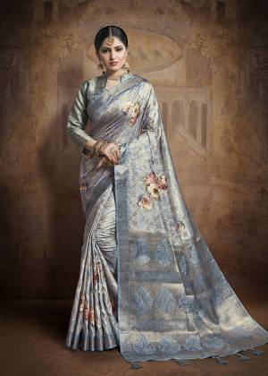 Flaunt Your Rich And Elegant Taste Wearing This Designer Saree In Steel Blue Color Paired With Steel Blue Colored Blouse. This Saree And Blouse Are Fabricated On Jacquard Silk Beautified With Weave All Over. 