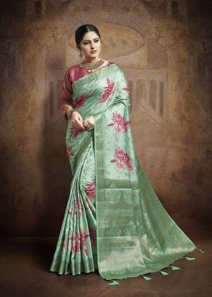Celebrate This Festive Season In This Very Beautiful And Attractive Looking Designer Saree In Sea Green Color Paired With Contrasting Dark Pink Colored Blouse. This Saree and Blouse Are Fabricated On Jacquard Silk Beautified With Weave All Over. Buy This Saree Now.