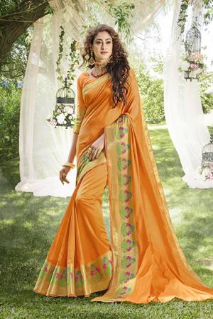 Simple And Elegant Looking Pretty Saree Is Here In Orange Color Paired With Orange Colored Blouse. This Saree And Blouse Are Fabricated On Khadi Silk Beautified With Weave Over The Saree Border. 