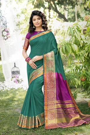 Simple And Elegant Looking Pretty Saree Is Here In Sea Green Color Paired With Purple Colored Blouse. This Saree And Blouse Are Fabricated On Khadi Silk Beautified With Weave Over The Saree Border. 