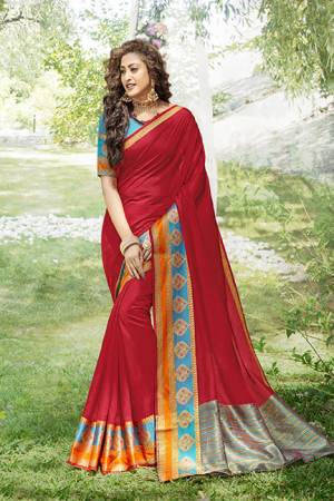 Look Pretty In This Beautiful Saree In Red Color Paired With Blue Colored Blouse. This Saree and Blouse Are Fabricated On Khadi Silk Beautified With Weaved Border. Buy Now.