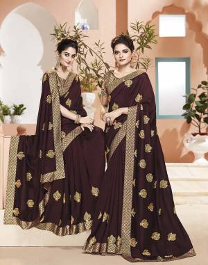 Celebrate This Festive Season Wearing This Designer Saree In Brown Color. This Saree Is Fabricated On Art Silk Paired With Brocade Fabricated Blouse. It Is Beautified with Jari Embroidery And Weaving. 