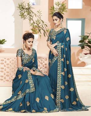 Grab This Pretty Designer Saree In Blue Color. This Saree Is Silk Based Paired With Brocade Fabricated Blouse. Its Fabric And Color Gives A Rich Look To Your Personality. 