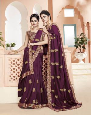 Celebrate This Festive Season Wearing This Designer Saree In Wine Color. This Saree Is Fabricated On Art Silk Paired With Brocade Fabricated Blouse. It Is Beautified with Jari Embroidery And Weaving. 