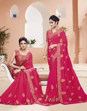 Grab This Pretty Designer Saree In Rani Pink Color. This Saree Is Silk Based Paired With Brocade Fabricated Blouse. Its Fabric And Color Gives A Rich Look To Your Personality. 