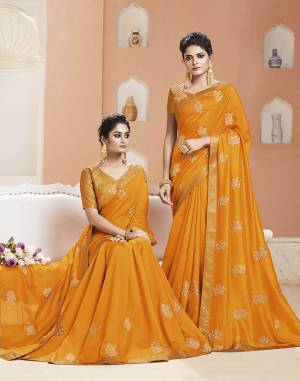 Celebrate This Festive Season Wearing This Designer Saree In Musturd Yellow Color. This Saree Is Fabricated On Art Silk Paired With Brocade Fabricated Blouse. It Is Beautified with Jari Embroidery And Weaving. 