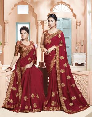Grab This Pretty Designer Saree In Red Color. This Saree Is Silk Based Paired With Brocade Fabricated Blouse. Its Fabric And Color Gives A Rich Look To Your Personality. 