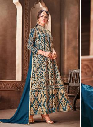 Enhance Your Personality Wearing This Heavy Designer Indo-Western Suit In Blue Color. Its Heavy Embroidered Top Is Fabricated On Net Paired With Santoon Bottom And Chiffon Fabricated Dupatta. 