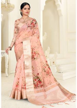 Flaunt Your Rich And Elegant Taste Wearing This Lovely Floral Printed Designer Saree In Peach Color. This Pretty Saree Is Fabricated On Orgenza Which Also Gives An Elegant Look To Your Personality. 