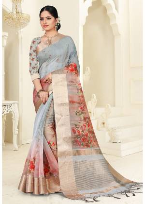 Celebrate This Festive Season With Beauty And Comfort Wearing This Printed Saree In Baby Blue color. This Saree Is Fabricated On Orgenza Which Is Light Weight And Easy To Carry Throughout The Gala.