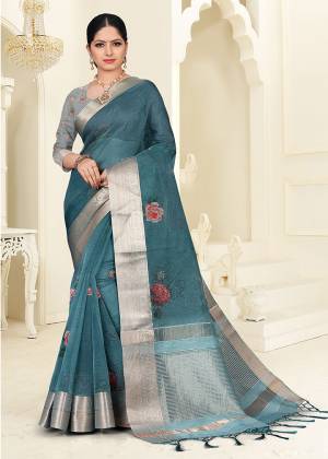 Flaunt Your Rich And Elegant Taste Wearing This Lovely Floral Printed Designer Saree In Teal Blue Color. This Pretty Saree Is Fabricated On Orgenza Which Also Gives An Elegant Look To Your Personality. 