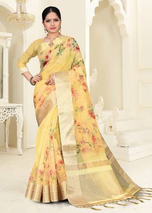You Will Definitely Earn Lots Of Compliments Wearing This Designer Saree In Yellow Color. This Saree Is Orgenza Based Beautified With Floral Prints. Buy This Saree Now.