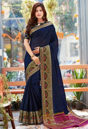 Celebrate This Festive Season Wearing This Pretty Saree In Navy Blue Color. This Saree And Blouse Are Fabricated On Khadi Silk Beautified With Weaved Border.