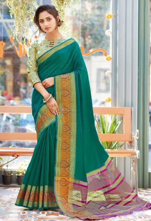 Celebrate This Festive Season Wearing This Pretty Saree In Teal Green Color. This Saree And Blouse Are Fabricated On Khadi Silk Beautified With Weaved Border.