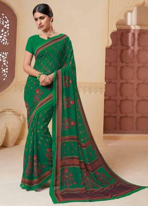 For Your Casual Wear Grab This Pretty Printed Saree, This Saree And Blouse Are Fabricated On Georgette Beautified With Prints. Buy This Saree Now.