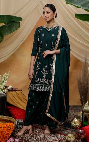 Grab Thi Pretty Designer Straight Suit In Pine Green Color. This Beautiful Detailed Embroidered Suit Is Chinon Based Which Is Light In Weight And Easy To Carry All Day Long. 