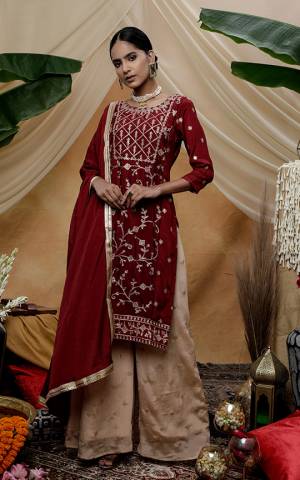 Grab Thi Pretty Designer Straight Suit In Maroon Color. This Beautiful Detailed Embroidered Suit Is Chinon Based Which Is Light In Weight And Easy To Carry All Day Long. 