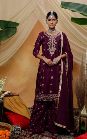 Grab Thi Pretty Designer Straight Suit In Wine Color. This Beautiful Detailed Embroidered Suit Is Chinon Based Which Is Light In Weight And Easy To Carry All Day Long. 