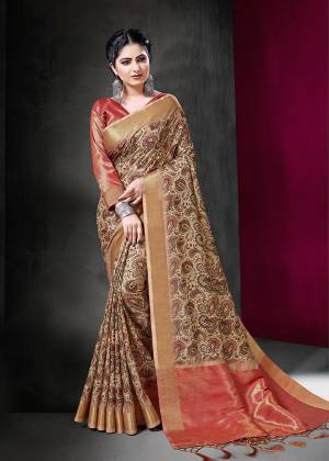 Here Is A Rich And Elegant Looking Silk Based Designer Saree For Festive Or Semi-Casual Wear. This Beautiful Saree And Blouse Are Fabricated On Art Silk Beautified With Prints. Buy Now.