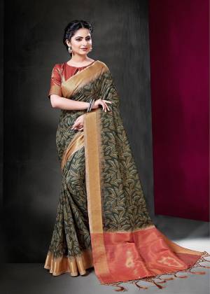 Here Is A Rich And Elegant Looking Silk Based Designer Saree For Festive Or Semi-Casual Wear. This Beautiful Saree And Blouse Are Fabricated On Art Silk Beautified With Prints. Buy Now.