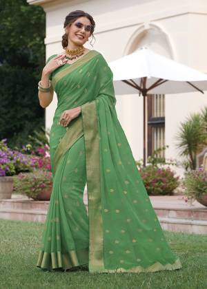 Simple And Elegant Looking Saree Is Here In Green Color Fabricated On Chiffon. This Saree Is Light Weight, Easy To Drape And Carry All Day Long. 