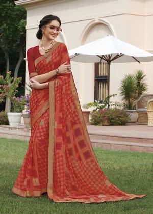 Grab This Pretty Georgette Based Saree For Your Semi-Casual Wear Which Is Light In Weight And Beautified With Prints. 