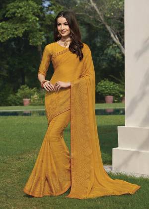 Simple And Elegant Looking Saree Is Here In Musturd Yellow Color Fabricated On Chiffon. This Saree Is Light Weight, Easy To Drape And Carry All Day Long. 
