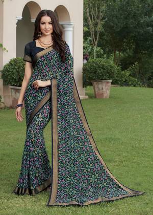 Here Is A Pretty Saree For Your Casual Or Semi-Casual Wear. This Printed Saree Is Fabricated On Georgette WhichIs Light Weight, Durable And Easy To Carry All Day Long. Buy Now.