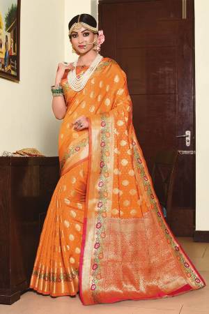 For A Proper Traditional Look, Grab This Designer Silk Based Saree In Orange Color Paired With Contrasting Dark Pink Colored Blouse. This Saree And Blouse Are Fabricated On Art Silk Beautified With Weave. 