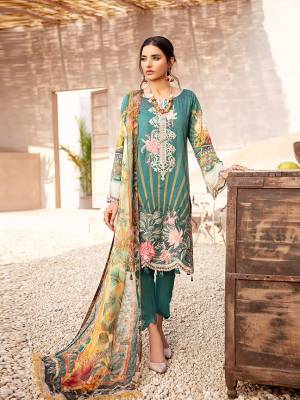 Grab This Pretty Designer Straight Suit In Teal Green Color. Its Top Is Fabricated On Cotton Satin Paired With Cotton Bottom and Muslin Fabricated Dupatta. It Is Beautified With Digital Prints And Thread Work. Buy Now.