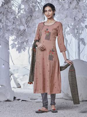 Here Is A Pretty Reeadymade Straight Suit In Dusty Peach Color. This Readymade Suit Is Available In All Regular Sizes And Also It Is Light In Weight And Easy To Carry All Day Long. 