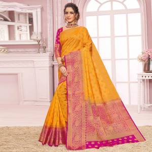 For A Proper Traditional Look, Grab This Designer Saree In Musturd Yellow Color Paired With Rani Pink Colored Blouse. This Saree Is Fabricated On Nylon Crepe Silk Paired With Art Silk Fabricated Blouse. 