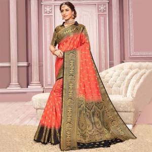 Here Is Rich And Elegant Looking Saree In Dark Peach Color Paired With Black Colored blouse. This Saree Is Nylon Crepe Silk Based Paired With Art Silk Fabricated Blouse. 