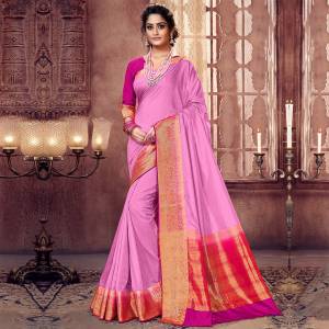 Simple And Elegant Looking Silk Based Saree Is Here In Pink Color. This Pretty Saree And Blouse Are Fabricated On Art Silk Beautified With Weaved Border. Buy Now.