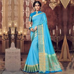 Celebrate This Festive Season With Beauty And Comfort Wearing This Blue Colored Saree. This saree and Blouse Are Silk Based Beautified With Weaved Border. Buy Now.