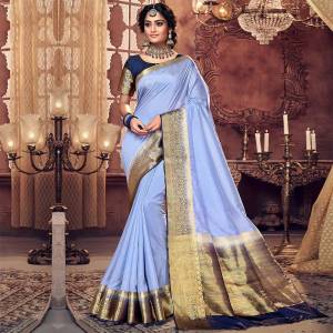 Simple And Elegant Looking Silk Based Saree Is Here In Grey Color. This Pretty Saree And Blouse Are Fabricated On Art Silk Beautified With Weaved Border. Buy Now.