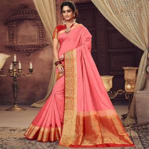 Celebrate This Festive Season With Beauty And Comfort Wearing This Pink Colored Saree. This saree and Blouse Are Silk Based Beautified With Weaved Border. Buy Now.