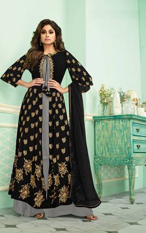 Get Ready For The Upcoming Festive And Wedding Season With This Heavy Designer Indo-Western Suit In Black And Grey Color. Its Elegant Embroidered And Bottom Are Fabricated On Georgette Paired With Chiffon Fabricated Dupatta. Buy Now.