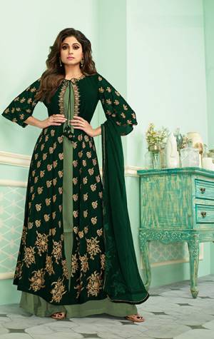 Get Ready For The Upcoming Festive And Wedding Season With This Heavy Designer Indo-Western Suit In Light Green And Dark Green Color. Its Elegant Embroidered And Bottom Are Fabricated On Georgette Paired With Chiffon Fabricated Dupatta. Buy Now.