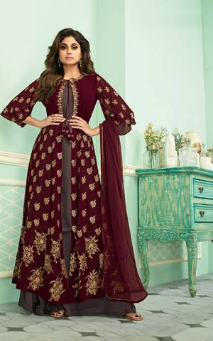 Get Ready For The Upcoming Festive And Wedding Season With This Heavy Designer Indo-Western Suit In Maroon And Mauve Color. Its Elegant Embroidered And Bottom Are Fabricated On Georgette Paired With Chiffon Fabricated Dupatta. Buy Now.