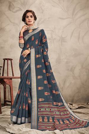 Here Is A Pretty Traditional Looking Designer Saree In Grey Color. This Pretty Saree And Blouse Are Fabricated On Chanderi Beautified With Resham And Jari Work. It Is Light In Weight and Easy To Carry All Day Long. 