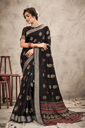 Here Is A Pretty Traditional Looking Designer Saree In Black Color. This Pretty Saree And Blouse Are Fabricated On Chanderi Beautified With Resham And Jari Work. It Is Light In Weight and Easy To Carry All Day Long. 