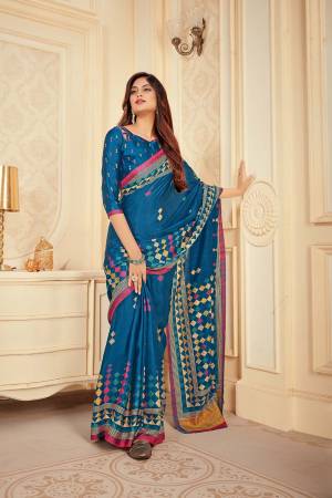 Simple and Elegant Looking Saree Is Here In Blue Color Paired With Contrasting Yellow Colored Blouse. This Saree And Blouse Are Fabricated On Satin Silk Beautified With Prints. It Is Light Weight , Soft Towards Skin and Easy To Carry All Day long. 