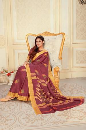 Flaunt Your Rich And Elegant Taste Wearing This Pretty Maroon colored Saree. This Saree And Blouse Are Satin Silk Based Beautified With Prints. Buy This Saree Now.