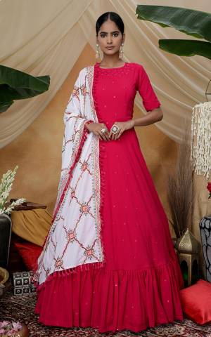 Adorn The Pretty Angelic Look Wearing This Designer Floor Length Suit In Red Color Paired With White Colored Dupatta. This Pretty Top And Embroidered Dupatta Are Fabricated On Georgette Beautified Thread Work. 