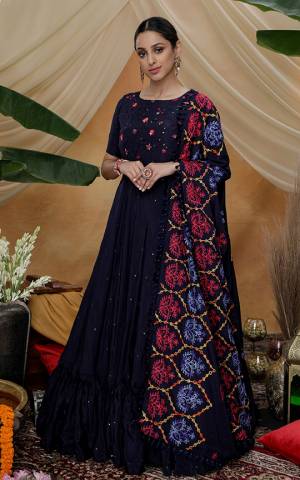 Enhance Your Personality Wearing This Beautiful Semi-Stitched Designer Suit In Navy Blue Color. Its Top and Dupatta Are Silk Based Which Gives A Rich Look To Your Personality. 