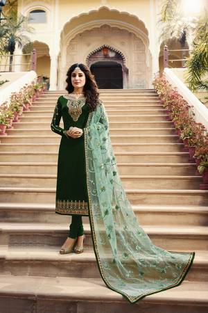Grab This Very Beautiful Designer Straight Suit In Green Color Paired With Pretty Embroidered Light Green Colored Dupatta. Its Top Is Fabricated On Satin Georgette Paired With Santoon Bottom and Net Fabricated Dupatta. Buy This Designer Embroidered Suit Now.